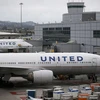 Máy bay của Hãng hàng không United Airlines tại sân bay quốc tế San Francisco, bang California. (Ảnh: AFP/TTXVN)
