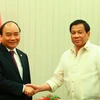Thủ tướng Nguyễn Xuân Phúc gặp Tổng thống Philippines Rodrigo Roa Duterte. (Ảnh: Thống Nhất/TTXVN)
