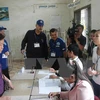 Các cử tri Campuchia bỏ phiếu bầu cử Quốc hội Campuchia khóa V. (Nguồn: TTXVN)