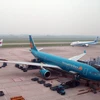 Máy bay của Vietnam Airlines tại sân bay quốc tế Nội Bài, Hà Nội. (Ảnh: Huy Hùng/TTXVN)
