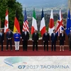 Chủ tịch Hội đồng châu Âu Donald Tusk và Lãnh đạo các nước G7. (Ảnh: AFP/TTXVN)