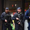 Cảnh sát làm nhiệm vụ gần hiện trường vụ tấn công ở khu Borough Market ngày 4/6. (Ảnh: EPA/TTXVN) 