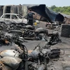  Hiện trường vụ cháy xe bồn chở dầu ở Bahawalpur. (Ảnh: EPA/TTXVN)