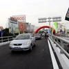 Thông xe cầu vượt tại nút giao đường Trường Sơn-Tân Sơn Nhất- Bình Lợi-Vành đai ngoài. (Ảnh: Hoàng Hải/TTXVN)