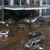 Cảnh ngập lụt sau những trận mưa lớn. (Ảnh: AFP/TTXVN)
