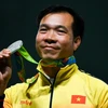 Xạ thủ Hoàng Xuân Vinh mang về tấm Huy chương thứ hai cho thể thao Việt Nam tại Olympic Rio ngày 10/8/2016. (Ảnh: AFP/TTXVN)