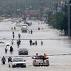 Cảnh ngập lụt do mưa lớn trong bão Harvey ở Houston, bang Texas ngày 27/8 tới. (Ảnh: AFP/TTXVN)