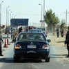 Cảnh sát Ai Cập kiểm tra an ninh tại Bắc Sinai. (Ảnh: AFP/TTXVN)