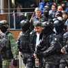 Cảnh sát Mexico bắt giữ tội phạm ma túy ở Mexico City. (Ảnh: AFP/TTXVN)