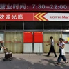 Một cửa hàng Lotte ở thủ đô Bắc Kinh đóng cửa ngày 15/9 vừa qua. (Ảnh: AFP/TTXVN)