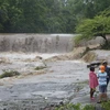 Nước lũ dâng do mưa lớn sau khi bão Nate đổ bộ vào Masachapa, Nicaragua ngày 5/10. (Ảnh: AFP/TTXVN)