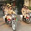 Lực lượng cảnh sát giao thông ra quân. (Ảnh: Doãn Tấn/TTXVN)