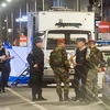 Binh sỹ và cảnh sát Bỉ gác tại thủ đô Brussels. (Ảnh: AFP/TTXVN)