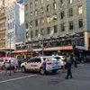 Cảnh sát điều tra tại hiện trường vụ lao xe vào người đi bộ ở Melbourne. (Ảnh: ABC News/TTXVN)