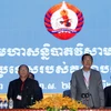Chủ tịch CPP, Thủ tướng Campuchia Samdech Hun Sen và Chủ tịch danh dự CPP, Chủ tịch Quốc hội Samdech Heng Samrin tại Đại hội bất thường của CPP ngày 19/1 vừa qua. (Ảnh: THX/TTXVN)