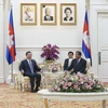 Thủ tướng Chính phủ Vương quốc Campuchia Samdech Hun Sen tiếp Bộ trưởng Công an Tô Lâm. (Ảnh: Phan Minh Hưng/TTXVN)