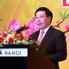 Phó Thủ tướng, Bộ trưởng Bộ Ngoại giao Phạm Bình Minh phát biểu tại buổi gặp mặt. (Ảnh: An Đăng/TTXVN)