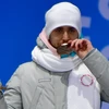 Vận động viên Alexander Krushelnitsky giành huy chương đồng nội dung bi đá trên băng đôi nam nữ tại Olympic PyeongChang ngày 14/2 vừa qua. (Ảnh: AFP/TTXVN)