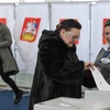 Cử tri Nga bỏ phiếu tại một điểm bầu cử ở thủ đô Moskva ngày 18//3. (Ảnh: AFP/TTXVN)
