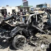 Hiện trường một vụ đánh bom tại Afghanistan. (Ảnh: AFP/TTXVN)