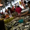 Một chợ cá ở Kuala Lumpur. (Ảnh: AFP/TTXVN)