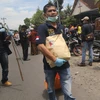 Cảnh sát Indonesia điều tra tại hiện trường một vụ tấn công. (Ảnh: AFP/TTXVN)