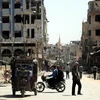 Cảnh đổ nát ở Douma, Đông Ghouta sau xung đột ngày 18/4 vừa qua. (Ảnh:THX/TTXVN)