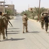 Các lực lượng Iraq tuần tra tại làng Anna, tỉnh Anbar của Iraq. (Ảnh: AFP/TTXVN)