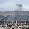 Khói bốc lên tại hiện trường một vụ tấn công bằng tên lửa ở Damascus của Syria ngày 9/5. (Ảnh: THX/TTXVN)