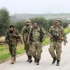 Lực lượng đồng minh với Thổ Nhĩ Kỳ tại Syria tuần tra ở thị trấn Jandairis, Afrin ngày 7/3 vừa qua. (Ảnh: AFP/TTXVN)