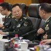 Ông Lý Tác Thành (giữa) tại một cuộc họp ở Bắc Kinh thuộc Trung Quốc. (Ảnh: AFP/TTXVN)
