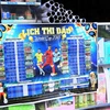  Lịch thi đấu World Cup 2018 được bày bán rất nhiều tại các cửa hàng tạp hóa trên địa bàn quận Hai Bà Trưng. (Ảnh: Quang Quyết/TTXVN)