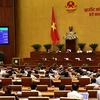 Quốc hội biểu quyết thông qua Luật An ninh mạng với tỷ lệ tán thành 86,86%. (Ảnh: Dương Giang/ TTXVN)