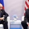 Tổng thống Mỹ Donald Trump và Tổng thống Nga Vladimir Putin. (Ảnh: AFP/TTXVN)