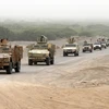 Các lực lượng ủng hộ Chính phủ Yemen làm nhiệm vụ tại khu vực al-Durayhimi, Hodeidah ngày 13/6 vừa qua. (Ảnh: AFP/TTXVN)