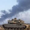 Xe quân sự của quân đội Israel được triển khai gần khu vực biên giới với Dải Gaza. (Nguồn: AFP/TTXVN)