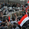 Người dân biểu tình phản đối dịch vụ công yếu kém tại thủ đô Baghdad của Iraq ngày 20/7. (Ảnh: AFP/TTXVN)