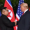 Tổng thống Mỹ Donald Trump và nhà lãnh đạo Triều Tiên Kim Jong-un. (Ảnh: AFP/TTXVN)
