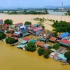 Nhiều điểm dân cư ở thôn Bùi Xá, huyện Chương Mỹ, Hà Nội chìm trong nước lũ ngày 25/7 vừa qua. (Ảnh: Nguyễn Thắng/TTXVN)