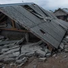 Cảnh đổ nát sau trận động đất ở làng Sajang, đảo Lombok của Indonesia ngày 31/7 vừa qua. (Ảnh: THX/TTXVN)