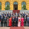 Chủ tịch nước Trần Đại Quang chụp ảnh chung với các Đại sứ, Trưởng đại diện cơ quan ngoại giao Việt Nam ở nước ngoài. (Ảnh: Nhan Sáng/TTXVN)