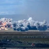 Đạn pháo nổ trong cuộc tập trận “Vostok-2018” ở miền đông Siberia ngày 13/9. (Ảnh: AFP/TTXVN)