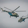 Máy bay trực thăng của Nga tham gia cuộc tập trận Vostok-2018 tại thao trường Klerka, trên vùng biển cách thành phố Vladivostok 100km về phía nam ngày 15/9. (Ảnh: AFP/TTXVN)