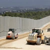 Bức tường ngăn cách biên giới Liban-Israel tại khu vực cửa khẩu Rosh Hanikra ngày 5/9 vừa qua. (Ảnh: AFP/TTXVN)