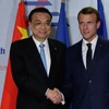 Thủ tướng Trung Quốc Lý Khắc Cường và Tổng thống Pháp Emmanuel Macron. (Nguồn: AFP)