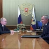 Tổng thống Nga Vladimir Putin và ông Rogozin. (Ảnh: AFP/TTXVN)