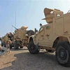 Binh sỹ thuộc liên quân do Saudi Arabia đứng đầu tuần tra tại thành phố cảng Aden, miền nam Yemen ngày 29/10 vừa qua. (Ảnh: AFP/TTXVN)