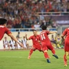 Các cầu thủ Việt Nam ăn mừng sau bàn thắng mở tỷ số của Công Phượng (số 14) ở phút 11 trong trận tuyển Việt Nam và tuyển Malaysia. (Ảnh: Trọng Đạt/TTXVN)