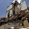 Cảnh đổ nát sau cuộc không kích của liên quân Arab do Saudi Arabia đứng đầu xuống thủ đô Sanaa của Yemen ngày 5/9 vừa qua. (Ảnh: THX/TTXVN)