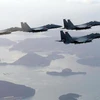 Hàn Quốc triển khai máy bay tiêm kích F-15K sau khi phát hiện máy bay Trung Quốc xâm phạm vùng nhận dạng phòng không Hàn Quốc, ngày 29/8 vừa qua. (Ảnh: EPA/TTXVN)